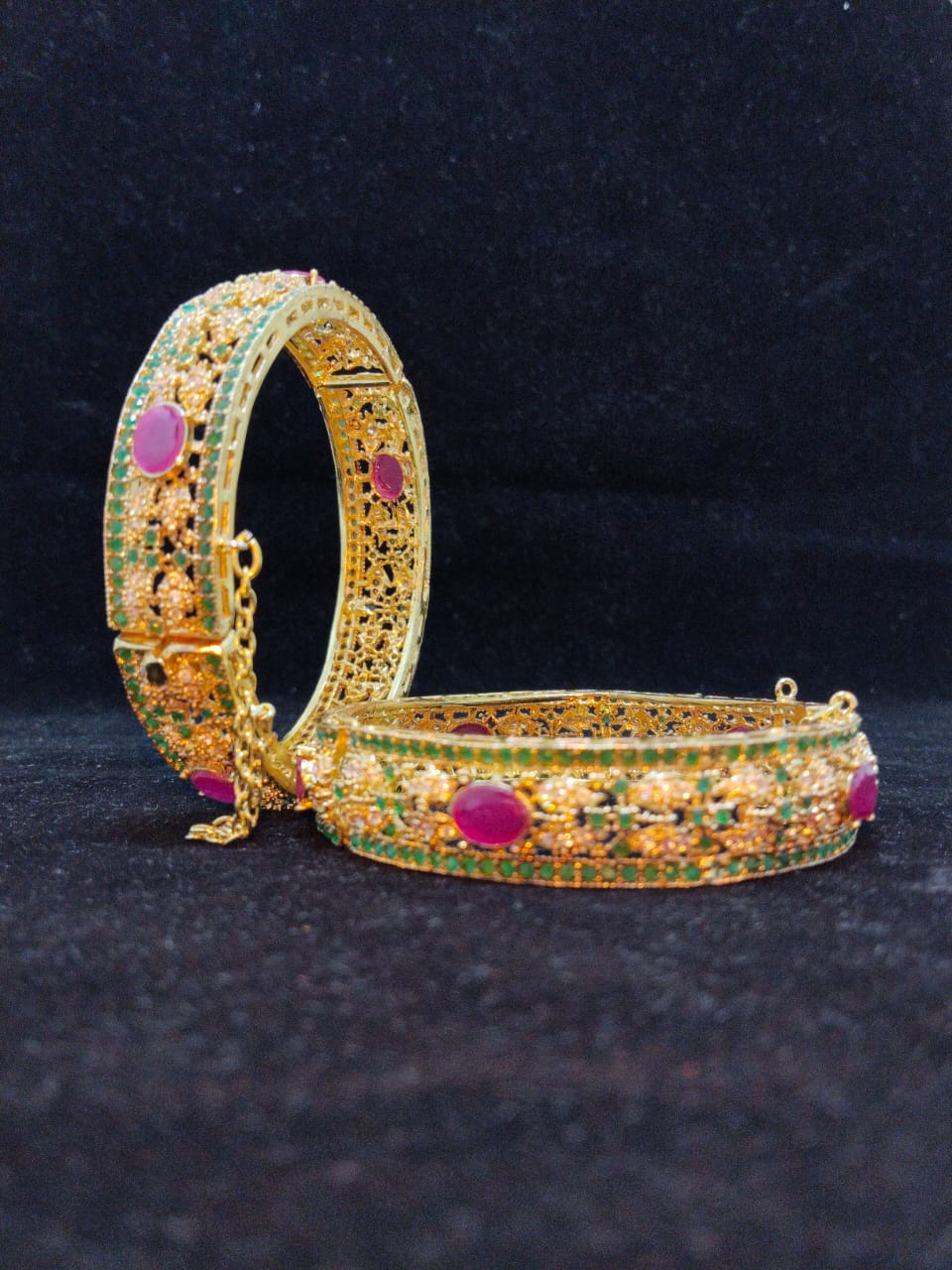 Elegant Gold-Plated Kara with Ruby and Emerald Stone