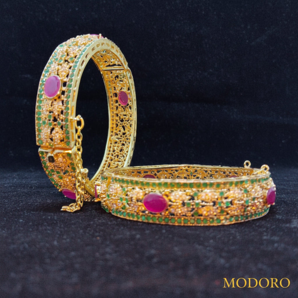 Elegant Gold-Plated Kara with Ruby and Emerald Stone