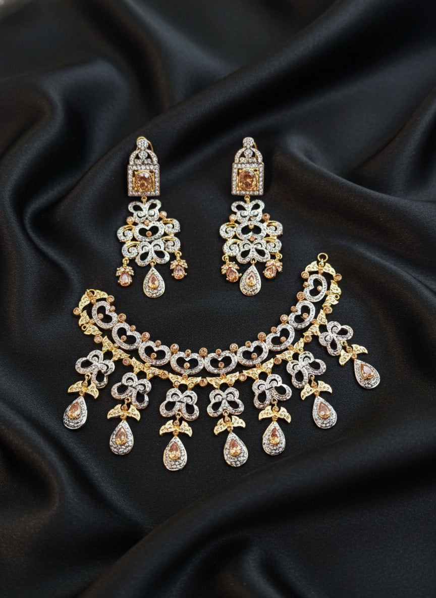 Ornate gold and silver jewelry set  with zircons