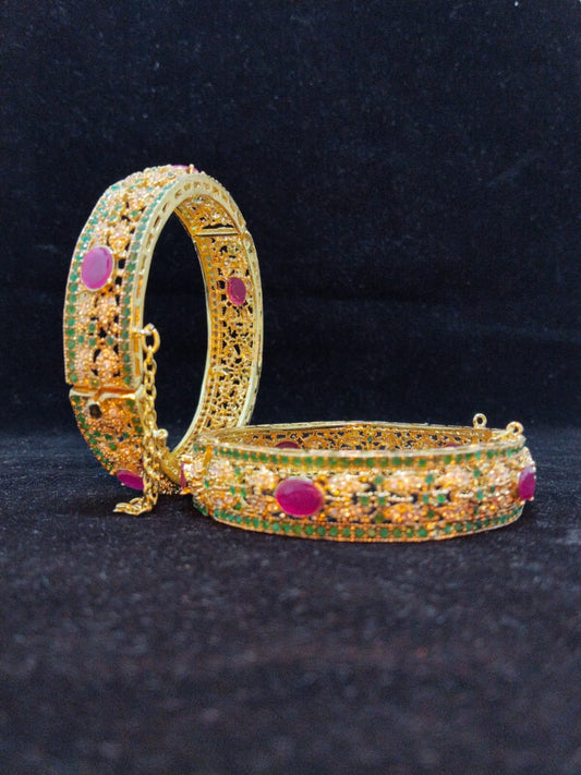 Elegant Gold-Plated Kara with Ruby and Emerald Stone